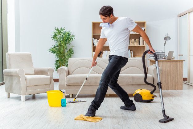 Premium Photo | Man husband cleaning the house helping wife | House cleaning services, Clean house, Domestic cleaning services