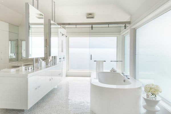 One trick professionals use to make a bathroom sparkle (like this one in Watermill, N.Y., designed by Jennifer Cohler Mason): Apply cleaner, but don’t scrub right away.